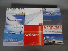 Dragon Wings - A group of six boxed diecast 1:400 scale model aircraft in various carrier liveries