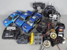 Nikko - Saicon - Zisheng - A mixed lot of 3 x radio control cars and spare parts including Saicon