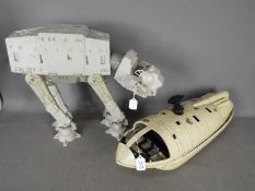 Star Wars, Kenner - A vintage Imperial AT-AT by Kenner (unboxed) and a Rebel Transport ship.