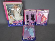 A boxed vintage Sindy doll Romance & Roses with 3 x mint on card lingerie outfits Fancy Free