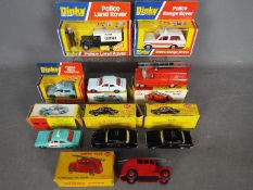 Dinky - A lot of 9 x boxed Dinky cars including # 168 Ford Escort, # 277 Police Land Rover,