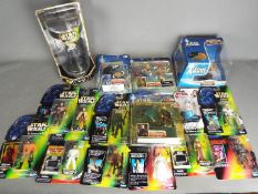 Star Wars - Hasbro - Kenner - A collection of 16 x boxed / carded figures including Hasbro Attack