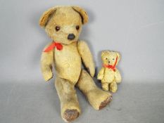 Teddy Bears - Two unboxed and unmarked vintage teddy bears.