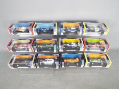 Atlas Editions - A starting grid of 12 boxed diecast racing cars from the Atlas Editions 'Grand