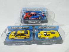 Scalextric - three 1:32 scale Scalextric cars comprising Ford GT40 MK IV #C3859.