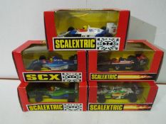 Scalextric - SCX - A group of 5 x cars including 2 x Jordan # 83570, # 8349,