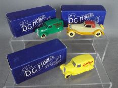 DG Models - A group of three boxed diecast model vehicles from DG Models.