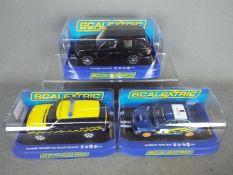 Scalextric - three 1;32 scale Scalextric cars comprising Jaguar XKR GT3 #C3144,