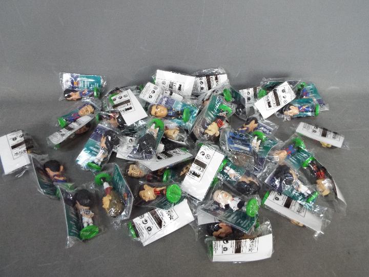 Corinthian - A collection of over 50 Corinthian Pro Stars football figures in sealed bags.