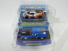 Scalextric - two 1:32 scale Scalextric racing cars comprising Ford Mustang Boss 302 #C3613 and