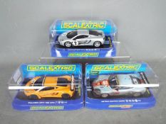 Scalextric - three 1:32 scale Scalextric cars comprising a Scalextric Club Aston Martin DBR9 #C2965,