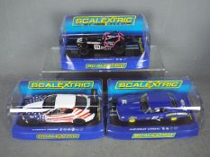 Scalextric - Three boxed Scalextric slot cars.