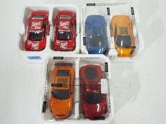 Scalextric - six Scalextric racing cars by Hornby in polystyrene molded cases