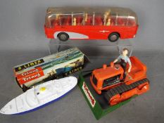 Triang, Minic, Mettoy - A pair of Triang toys with a Mettoy Luxury Coach.