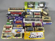 Lledo, Corgi, Matchbox Dinky, Others - A collection of boxed diecast vehicles in various scales.