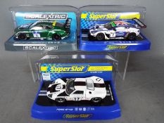 Scalextric, Superslot - Three boxed 1:32 scale slot cars.