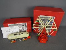 Tinplate - Two boxed modern tinplate toys.