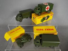 Dinky Toys - A collection of 4 predominately boxed diecast military toys.