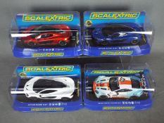 Scalextric - Four boxed Scalextric slot cars.