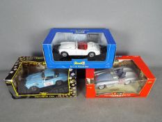 Jadi - Revell - Bburago - 3 x boxed 1:18 scale cars including Jadi Triumph TR4 Works Rally car,