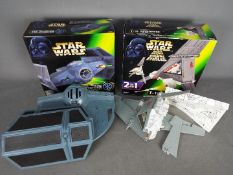 Star Wars, Hasbro - Two boxed Star Wars vehicles from Hasbro.