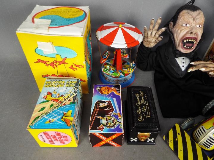 Technofix, Yone, Other - A collection of seven boxed and unboxed vintage and modern tinplate toys, - Image 2 of 3