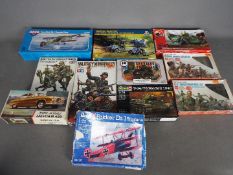 Tamiya, Airfix, Revell, Novo, Others - 11 boxed model kits in various scales.