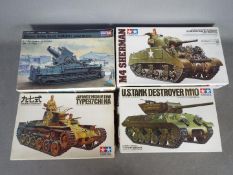 Tamiya, HobbyBoss - Four boxed plastic military vehicle model kits.