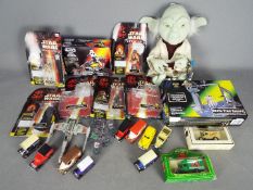 Star Wars, Hasbro - Two boxed Star Waes vehicles, a Star Wars soft toy of Joda,