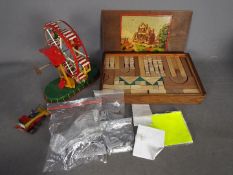 JW Toys - Fraction models - A mixed lot of vintage toys including tinplate clock work ferris wheel,