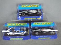 Scalextric - Three boxed Scalextric slot cars.