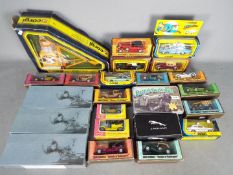 Corgi, Matchbox, Atlas Editions - A mixed collection of boxed diecast models in various scales.