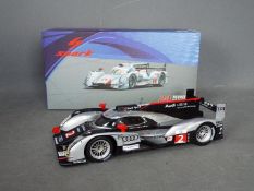 Spark - An Audi R8 etron Le Mans car in 1:18 scale # 18LM12.