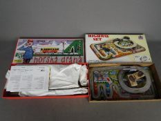 Kovar, Welby - Two boxed modern tinplate toy set.