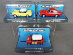 Scalextric - Three boxed 1:32 scale slot cars by Scalextric.