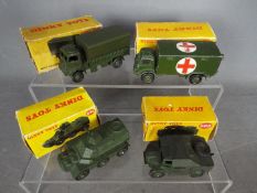 Dinky Toys - Four boxed diecast military vehicles from Dinky Toys.