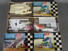 Scalextric, Triang - Three boxed vintage Scalextric buildings plastic model kits.