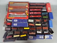 Hornby - Grafar - Wrenn - A collection of over 40 loose and boxed wagons and coaches including