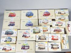 Corgi - A fleet of over 20 boxed diecast Corgi diecast model buses / tram.