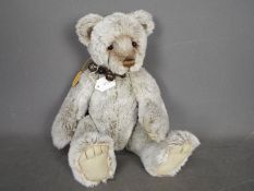 Charlie Bears - Lawrence a plush grey jointed bear from the 2011 Plush collection. # CB614891.