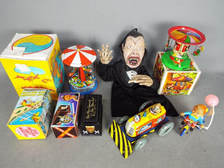 Technofix, Yone, Other - A collection of seven boxed and unboxed vintage and modern tinplate toys,