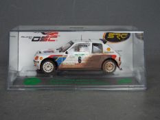 Slot Racing Company - A 1985 Peugeot 205 T16 Evo I rally car in Rally De Portugal livery.