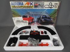Aurora - A boxed Aurora AFX Ghost Racer slot car racing set.