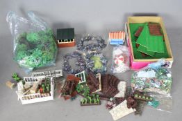 Britains - A collection of unboxed Britains Floral Garden pieces, including a selection of trees..
