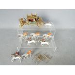 Britains - An unboxed Britains #1470 State Coach (post War Version) with gilt coloured coach,