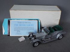 Franklin Mint - A boxed 1:24 scale 1907 Rolls Royce Silver Ghost from Franklin Mint.