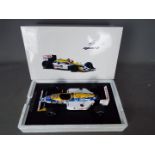 Spark - A 1:18 scale 1987 Williams FW 11B number 6 Formula 1 car as driven by Nelson Piquet in the