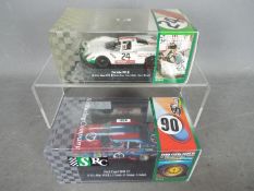 SRC - Two boxed SRC 1:32 scale slot cars.