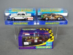 Scalextric - A group of 3 x slot cars, Ford GT40,