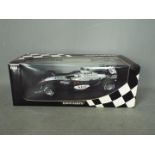 Minichamps - A boxed 1:18 scale McLaren Mercedes MP4-18 2003 test car for Alexander Wurz.